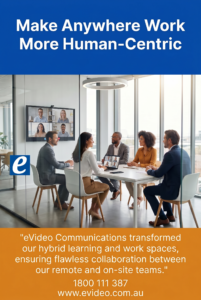 Team in a glass-walled conference room on a video call; large blue banner above reads 'Make Anywhere Work More Human-Centric'