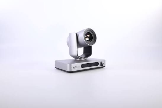 Silver adjustable spotlight mounted on a rectangular base against a white backdrop.