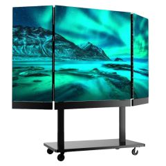 Three-panel curved LED display on a wheeled stand showing a teal aurora landscape.